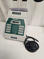 Baxter BAXA Pharmacy Repeater Pump Model 099, Manual and power cord.