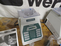 (2) Mint Baxter BAXA Pharmacy Repeater Pump Model 099 w/ Foot Pedals, Manuals
