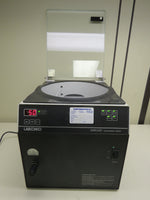 Labconco RapidVap Vacuum Solvent Evaporation System - vortex motion, heat, and vacuum